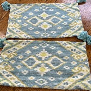 Chambray blue , cream and yellow pillow covers. Ikat style w/tassels on corners